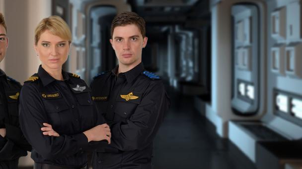 Three crew in a starship corridor